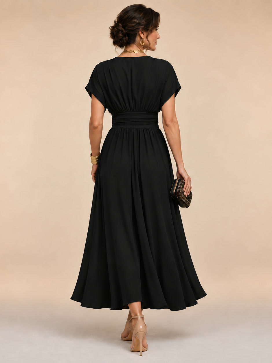 Marianna | Vestido midi cruzado con mangas murciélago y cintura plisada